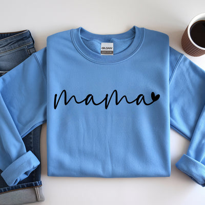 Blue sweatshirt with 'mama' text on a white surface with jeans and coffee.